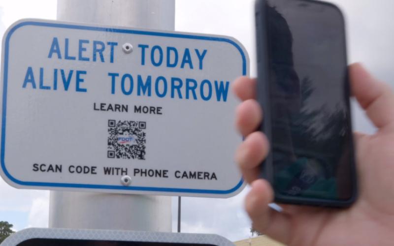 FDOT's pilot project is designed to keep pedestrians safe at crosswalks with the help of QR codes. (COURTESY)