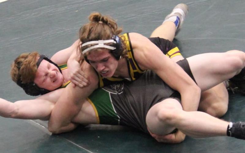 Columbia wrestler Joseph Rice grapples with an opponent last season. Rice was a state qualifier in his junior year. (COURTESY)