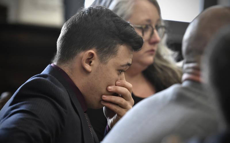 Kyle Rittenhouse puts his hand over his face as he is found not guilty on all counts at the Kenosha County Courthouse on Friday in Kenosha, Wis. (SEAN KRAJACIC/Pool/Getty Images/TNS)