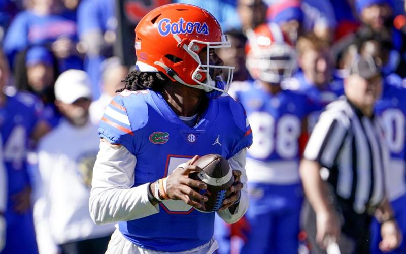 Florida quarterback Emory Jones looks for a receiver against Florida State on Nov. 27 in Gainesville, Fla. (JOHN RAOUX/Associated Press)