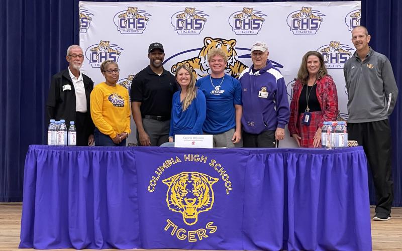 Columbia tennis player Camrin Wilcoxon signed his letter of intent with William Jessup University in California on Monday. (COURTESY)