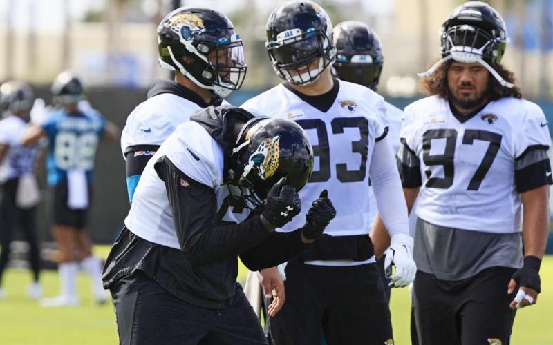 Jacksonville Jaguars defensive end Jihad Ward (6) dances in front of teammates defensive tackles Doug Costin (58), Taven Bryan (93) and Jay Tufele (97) during practice on Thursday at TIAA Bank Field's practice field in Jacksonville. (COREY PERRINE/The Florida Times-Union/TNS)