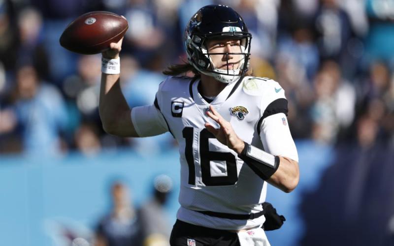 Jacksonville Jaguars quarterback Trevor Lawrence passes in the pocket against the Tennessee Titans on Dec. 12 in Nashville, Tenn. (WADE PAYNE/Associated Press)