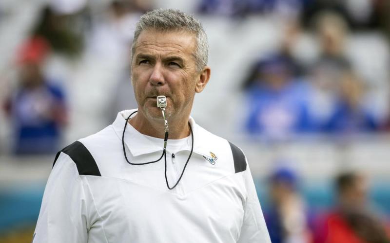 Jacksonville Jaguars head coach Urban Meyer watches his team warm up before a game against the Buffalo Bills on Nov. 7 in Jacksonville. Meyer's tumultuous NFL tenure ended after just 13 games — and two victories — when the Jacksonville Jaguars fired him early Thursday because of an accumulation of missteps. (STEPHEN B. MORTON/Associated Press)