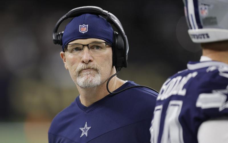 Dallas Cowboys acting head coach Dan Quinn walks the sidelines during a game against the New Orleans Saints on Dec. 2 in New Orleans. (BRETT DUKE/Associated Press)