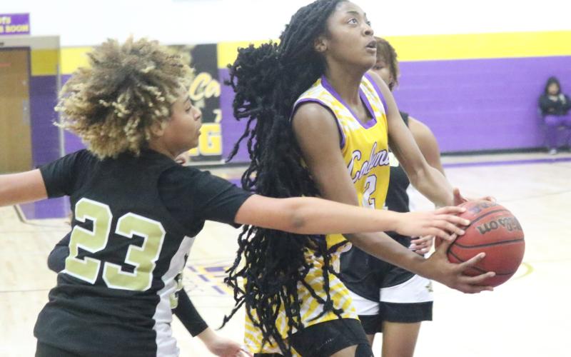Columbia guard Na’Haviya Paxton drives to the basket against Oakleaf on Wednesday night. (JORDAN KROEGER/Lake City Reporter)