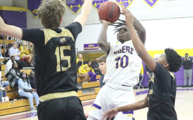 Columbia guard Isaac Broxey shoots against Buchholz on Tuesday night. (JORDAN KROEGER/Lake City Reporter)