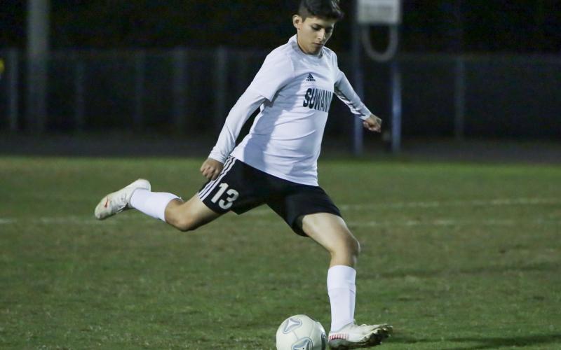 Suwannee's Alex Beristain passes the ball up the field against Columbia on Jan. 7. (BRENT KUYKENDALL/Lake City Reporter)