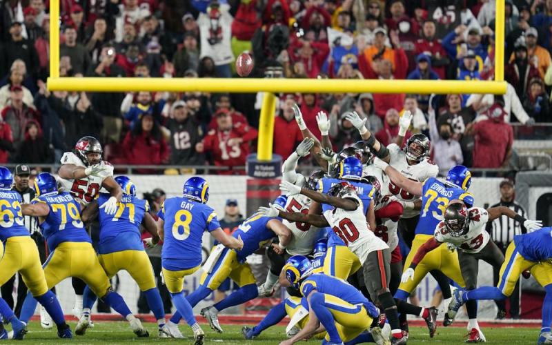 Los Angeles Rams' Matt Gay (8) kicks a 30-yard field goal to defeat the Tampa Bay Buccaneers in Sunday's divisional playoff game in Tampa. (JOHN RAOUX/Associated Press)