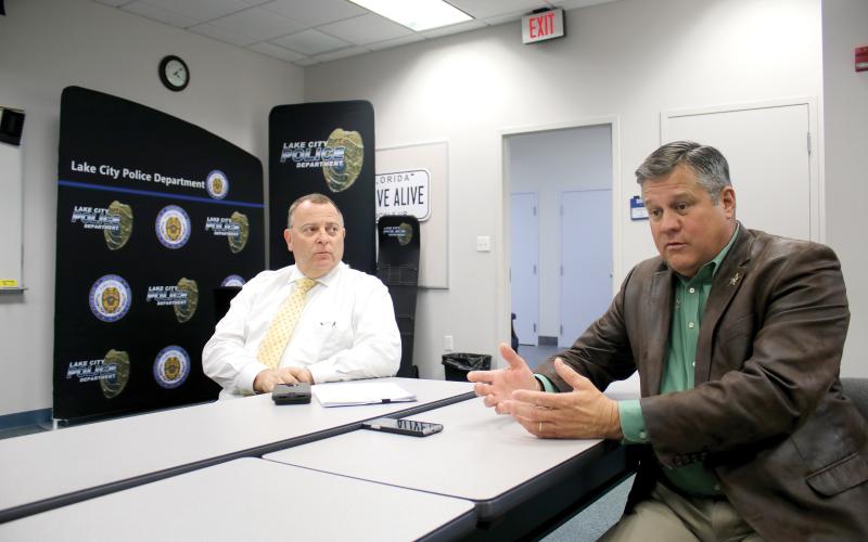 Sheriff Mark Hunter (right) and Lake City Interim Police Chief Gerald Butler have reached a deal to have the agencies work together more closely. (TONY BRITT/Lake City Reporter)