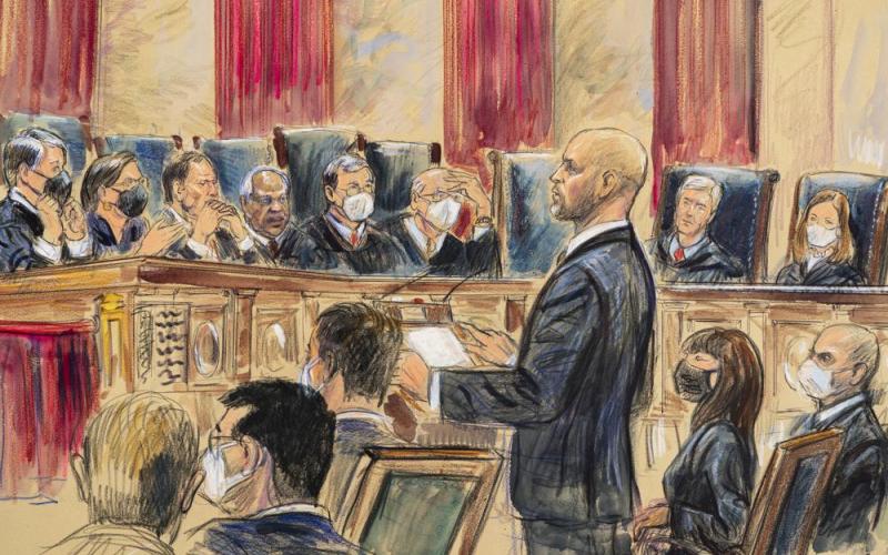 This artist sketch depicts lawyer Scott Keller standing to argue on behalf of more than two dozen business groups seeking an immediate order from the Supreme Court to halt a Biden administration order to impose a vaccine-or-testing requirement on the nation's large employers during the COVID-19 pandemic, at the Supreme Court in Washington, Jan. 7, 2022. (DANA VERKOUTEREN/Associated Press))