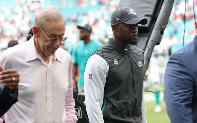 Miami Dolphins head coach Brian Flores, right, walks off the field next to Dolphins owner Stephen Ross after losing to the Atlanta Falcons at Hard Rock Stadium on Oct. 24, 2021, in Miami Gardens. (JOHN MCCALL/South Florida Sun-Sentinel/TNS)