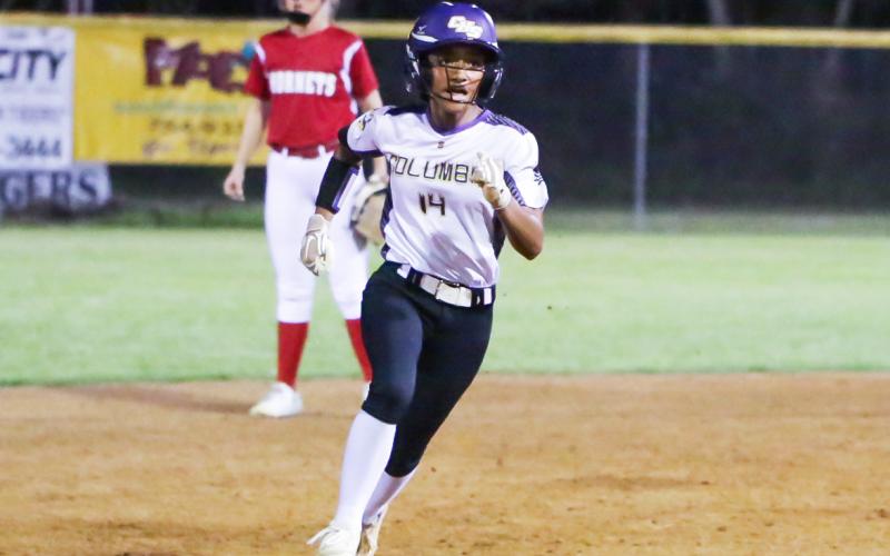 Columbia’s Sakiya Merriex rushes to third base against Lafayette on Thursday night. (BRENT KUYKENDALL/Lake City Reporter)