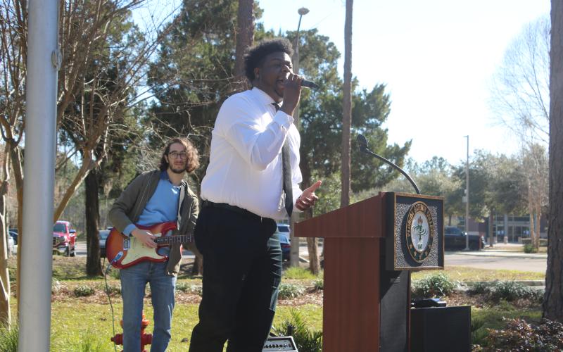 Kipp Walker (right) sings Marvin Gaye’s ‘What’s Going On’ while accompanied by Todd Siff on the electric guitar at Florida Gateway College on Tuesday morning. The two performed at the FGC Black History Month kickoff ceremony. (TONY BRITT/Lake City Reporter)