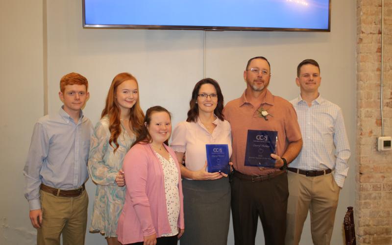 Dalton Thomas (from left), Darbie Thomas, Melanie Thomas, Jan Thomas, Darryl Thomas and DJ Thomas, pose for a photograph after Darryl Thomas was named the 2023 Columbia County Teacher of the Year. (TONY BRITT/Lake City Reporter)