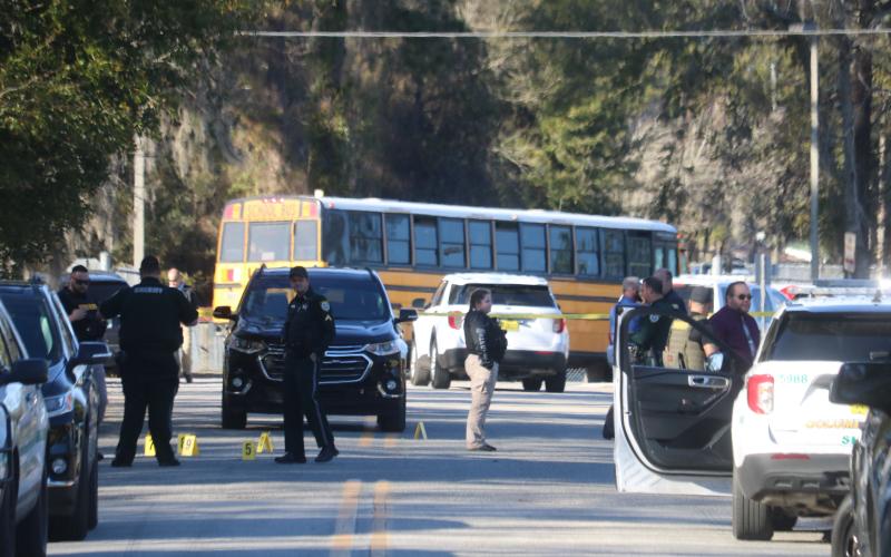 Law enforcement investigates a shooting incident on SW Winter Way near Lake City Middle School on Feb. 14. (FILE)