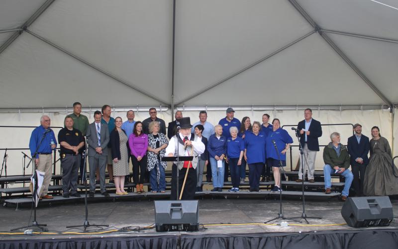 Tony Buzzella (center), commanding general of the Blue-Grey Army, starts off the Olustee Festival with some opening remarks Friday. (TONY BRITT/Lake City Reporter)