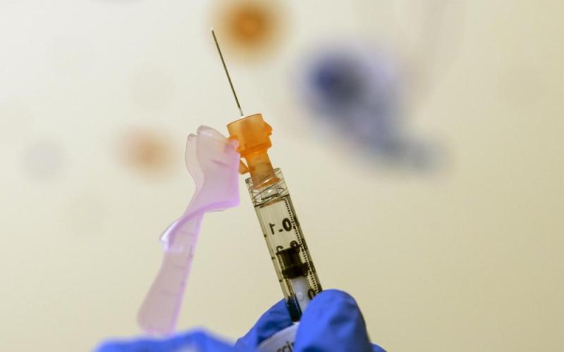 Nurse Lydia Holly prepares a child's covid-19 vaccine dose on Nov. 3, 2021, at Children's National Hospital in Washington. (AP File)