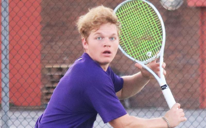 Columbia’s Camrin Wilcoxon gets ready to return a shot in a match last season. (JORDAN KROEGER/Lake City Reporter)