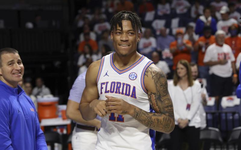 Florida forward Keyontae Johnson (11) smiles after being introduced as a starter before Saturday’s game against Kentucky in Gainesville, Fla. (MATT STAMEY/Associated Press)