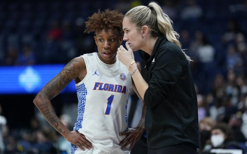 Florida head coach Kelly Rae Finley talks with Kiara Smith during a game against Vanderbilt at the women's Southeastern Conference tournament on March 3 in Nashville, Tenn. (MARK HUMPHREY/Associated Press)