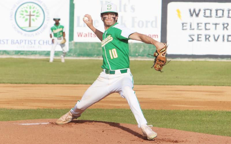 Suwannee pitcher Carstone Palmer throws a pitch against Valdosta on March 22. A tough schedule has benefitted the Bulldogs this season as they sit ranked first in Region 1-4A. (PAUL BUCHANAN/Special to the Reporter)