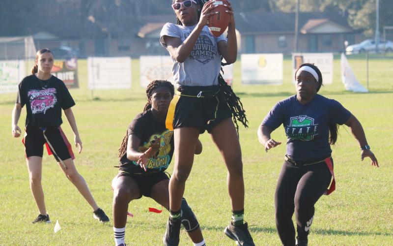 Columbia’s Na’Haviya Paxton catches a pass during Wednesday’s practice. (JORDAN KROEGER/Lake City Reporter)