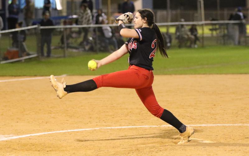 Fort White pitcher Kadence Compton winds up to pitch against Branford on Tuesday night. (MORGAN MCMULLEN/Lake City Reporter)