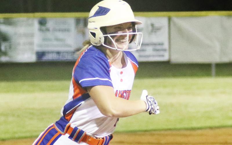 Branford outfielder Evie Pitts rounds third base after hitting a 2-run home run against Columbia on Monday. (MORGAN MCMULLEN/Lake City Reporter)