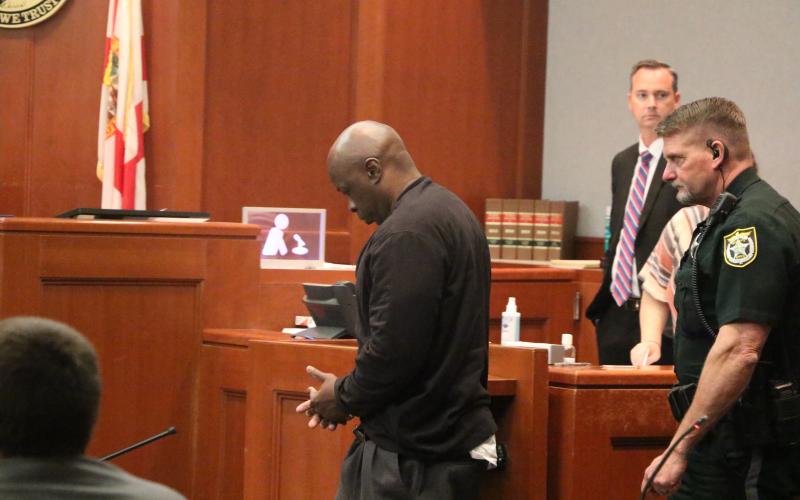 Richard P. Franklin (left) is escorted out of the Columbia County Courthouse Friday afternoon after a jury decided he wouldn’t face a death sentence for the 2012 murder of Columbia Correctional Institution officer Ruben Thomas. (MORGAN MCMULLEN/Lake City Reporter)