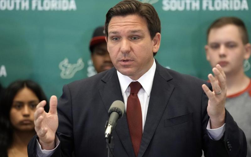 Florida Gov. Ron DeSantis speaks during a news conference after announcing a $20 million dollar program to create cybersecurity opportunities through the Florida Center for Cybersecurity at the University of South Florida Wednesday in Tampa. (CHRIS O’MEARA/Associated Press)