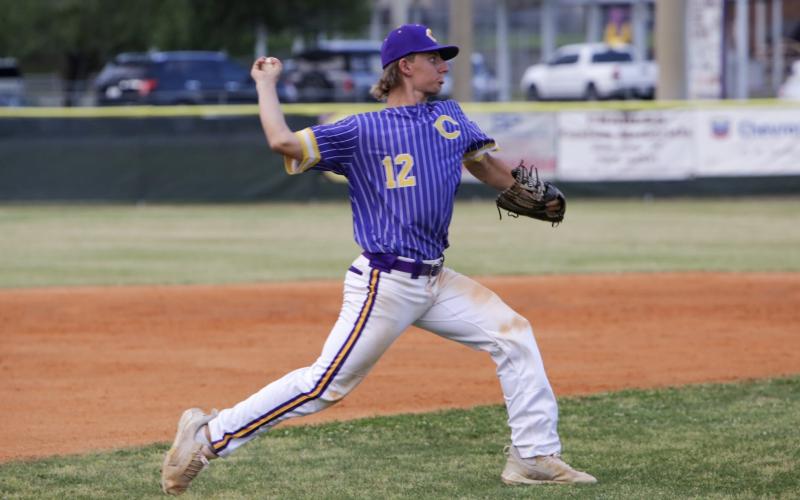 Columbia third baseman Ty Jackson throws to first base for an out against Middleburg on April 14. (BRENT KUYKENDALL/Lake City Reporter)