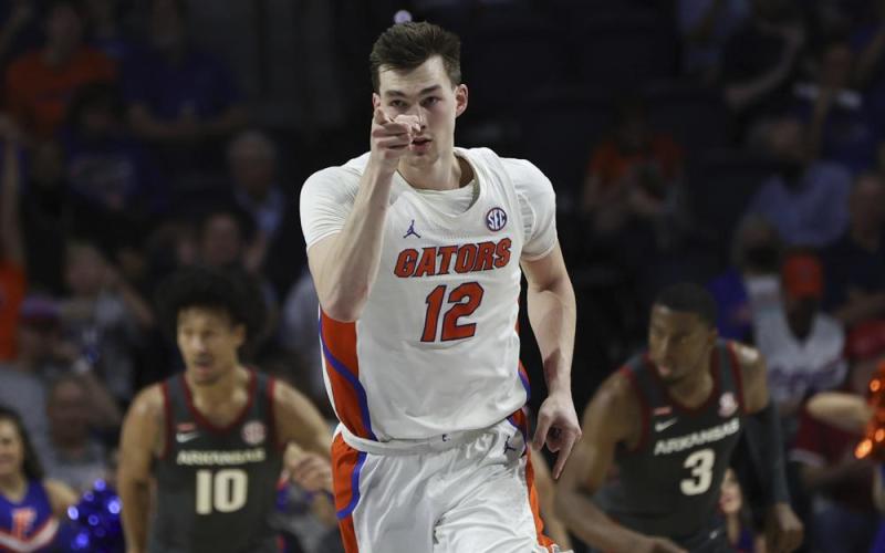 Florida forward Colin Castleton celebrates after making a shot against Arkansas on Feb. 22 in Gainesville. (MATT STAMEY/Associated Press)