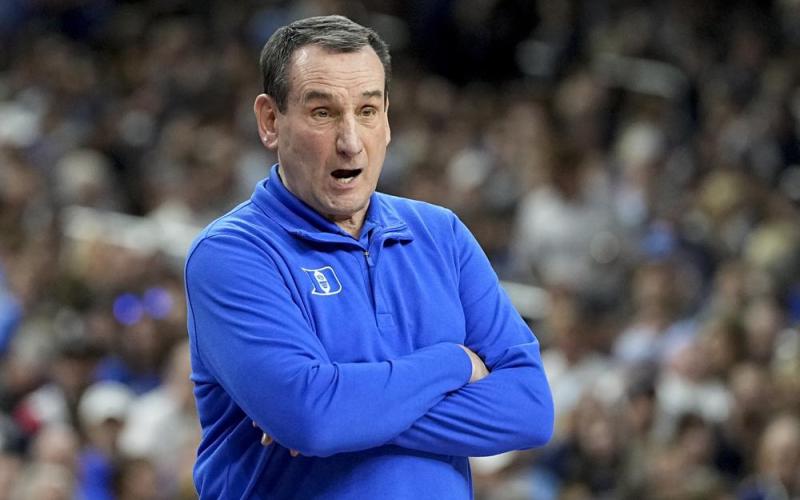 Duke head coach Mike Krzyzewski watches play during Saturday's Final Four contest against North Carolina in New Orleans. (DAVID J. PHILLIP/Associated Press)