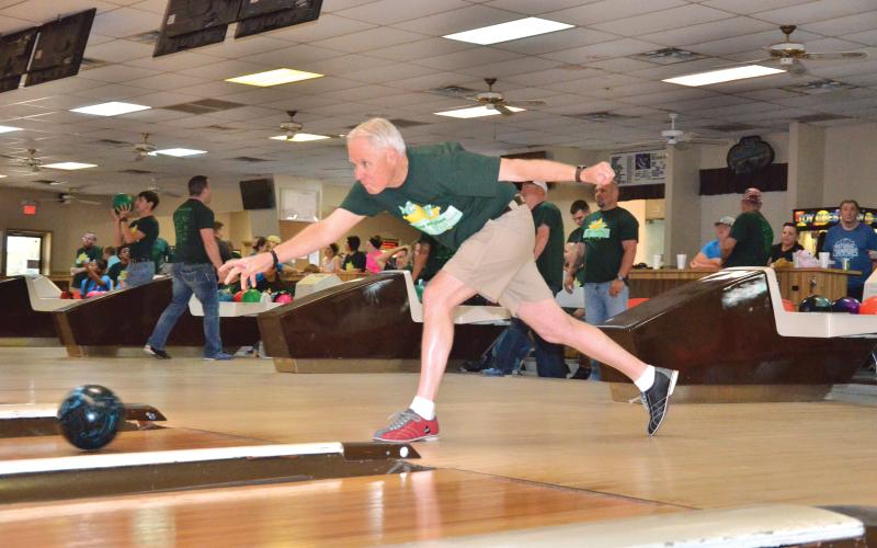Bill Frye, the president of the Florida Sheriffs Youth Ranches, takes his turn during the 2018 Fins and Pins event at Lake City Bowl. (FILE)