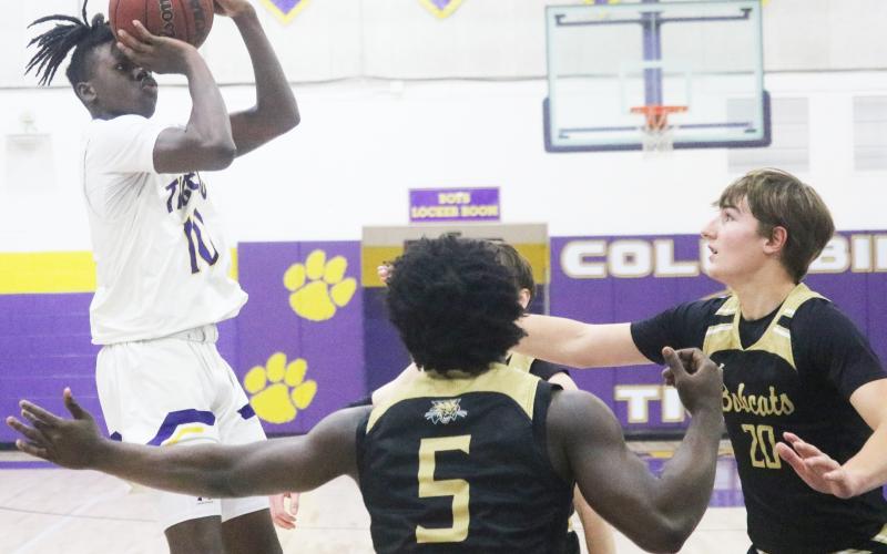 Columbia guard Isaac Broxey shoots against Buchholz during the District 3-6A quarterfinals on Feb. 8. (JORDAN KROEGER/Lake City Reporter)