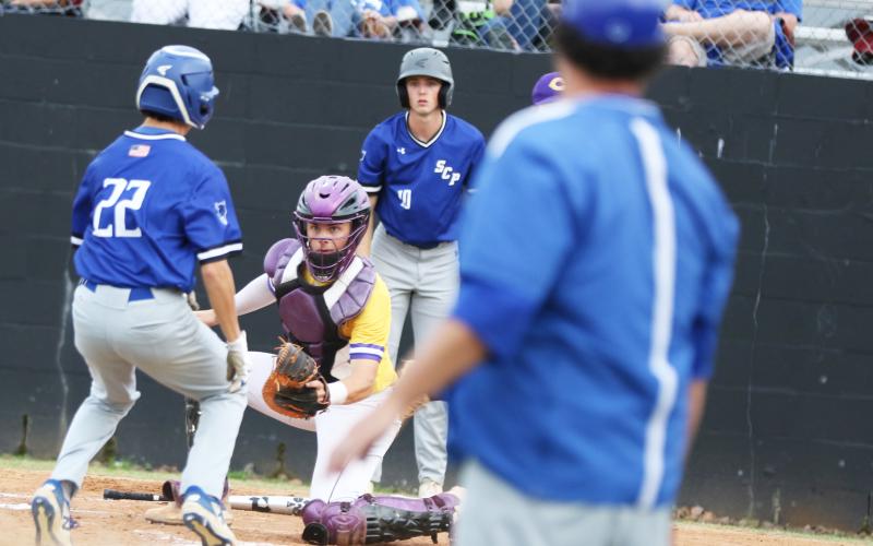 Columbia catcher Hayden Gustavson tags out Stanton’s Anderson Eller on Friday night. (MORGAN MCMULLEN/Lake City Reporter)