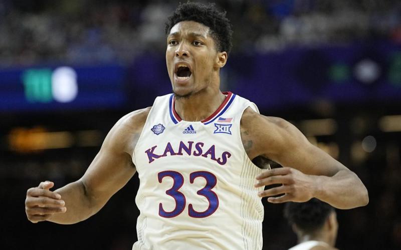 Kansas forward David McCormack celebrates after scoring against Villanova in Final Four on Saturday in New Orleans. (DAVID  J. PHILLIP/Associated Press)