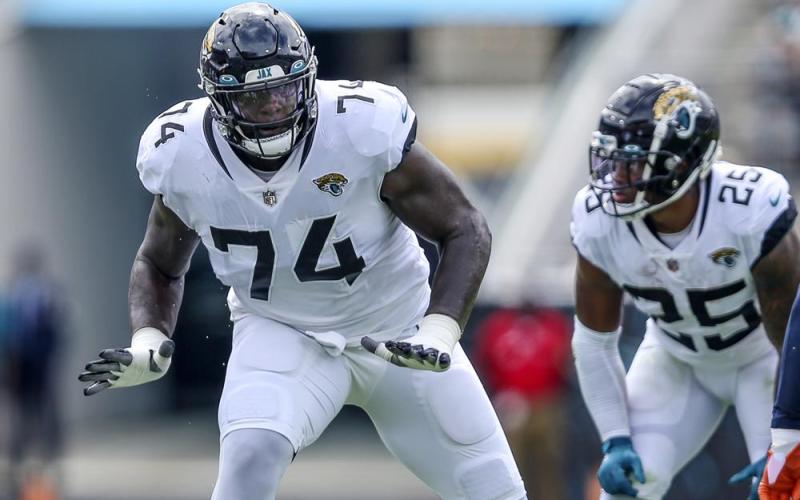 Jacksonville Jaguars offensive tackle Cam Robinson in action during a game against the Denver Broncos on Sept. 19, 2021, in Jacksonville. Robinson signed his franchise tender with the Jaguars on Wednesday, guaranteeing him $16.7 million this season. (AP File)