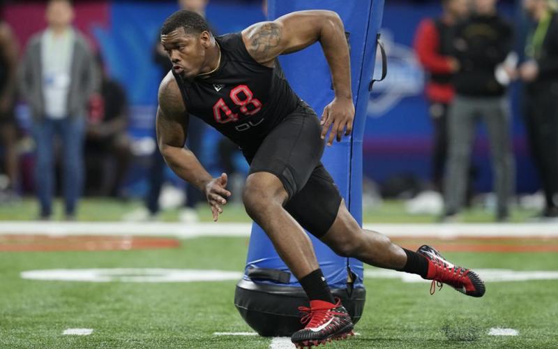 Georgia defensive lineman Travon Walker runs a drill during the NFL scouting combine on March 5 in Indianapolis. (AP File)