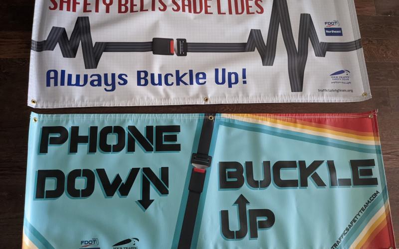 A pair of banners promoting traffic  safety that Frye received from the FDOT. (COURTESY)