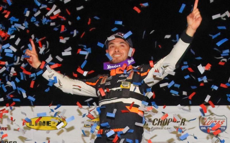 Kyle Larson celebrates amongst falling confetti after winning the General Tire Winter Nationals at All-Tech Raceway on Jan. 23, 2021. (FILE)