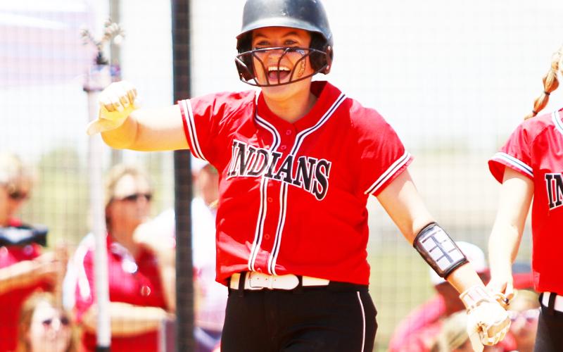 Fort White pitcher Kadence Compton celebrates after hitting a home run against Dixie County in the Class 1A state semifinals at Legends Way Ballfields on Tuesday in Clermont. (WILL TURNER/Special to the Reporter)
