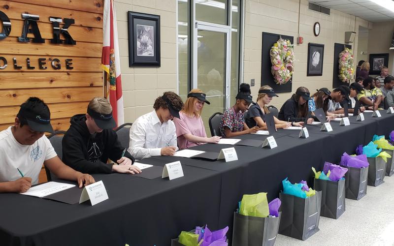 During a SkillsUSA National Signing Day event Thursday, 22 local high school students signed ‘letters of intent’ to pursue career and technical education at Riveroak Technical College. (COURTESY)