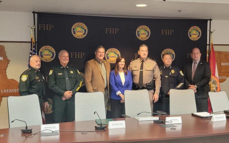 Suwannee County Sheriff Sam St. John (second from left), Columbia County Sheriff Mark Hunter (third from left) and Lake City Police Chief Gerald Butler (second from right) were part of a roundtable discussion with Lt. Gov. Jeanette Nunez (center) on drug and human trafficking on Monday. (COURTESY)