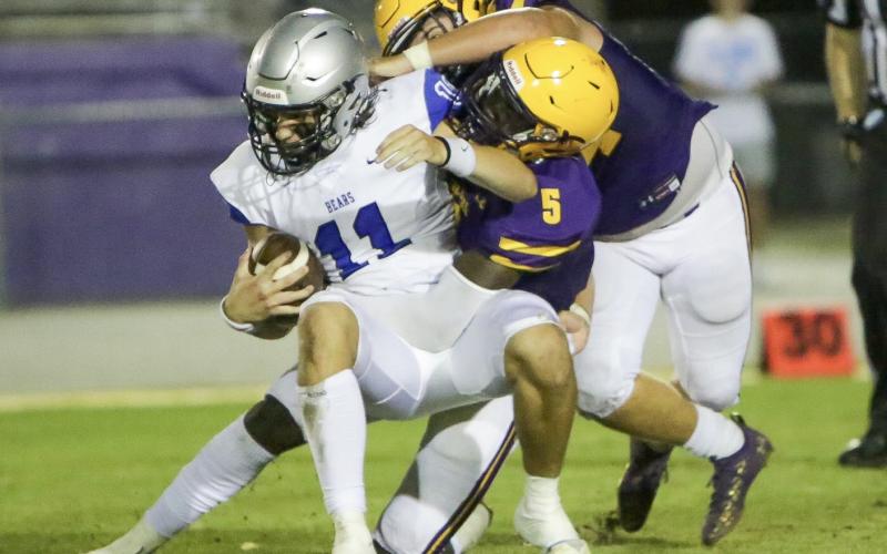 Columbia linebacker Jaden Robinson takes down Bartram Trail quarterback Riley Trujillo during the teams' spring game on Friday night. (BRENT KUYKENDALL/Lake City Reporter)