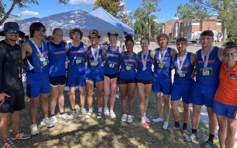 Branford’s track team brought home 11 medals from the Class 1A state meet on Wednesday in Gainesville. Team members pictured are coach Tim Clark (from left), Justin Hernandez, Ann Marie Mowrer, Austin Malaguti, Josue Sierra Berrios, Hannah Terry, Zamaria Granado, Nathalia Veal, Seth Humphries, Adrik Miller, Kyson Johnson and coach Erin Clark. Not pictured are Devin Mosley and Zoe Richmond. (COURTESY)