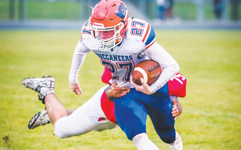 Branford receiver Brice Criggall escapes a tackle during last season’s game against Williston. (FILE)