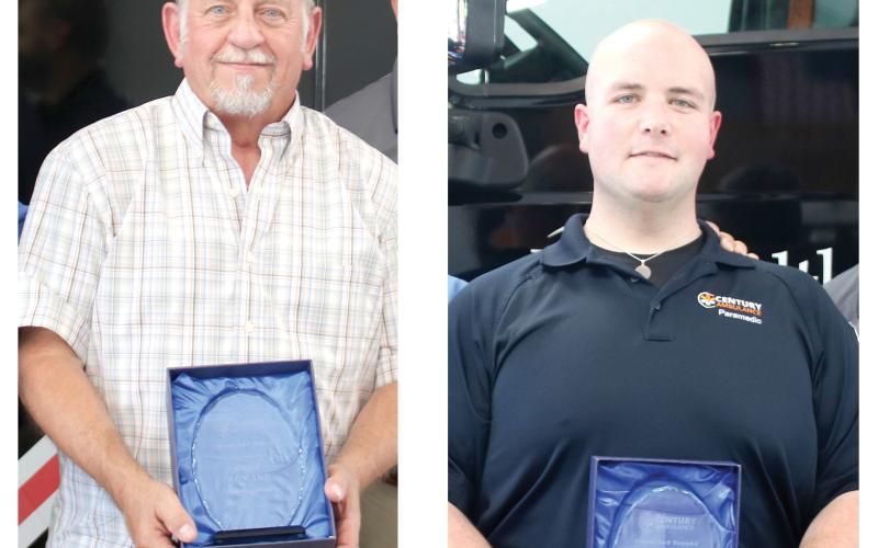 Century Ambulance recognized Gary Howard (left) and Thomas Stinson for their work the past year. (TONY BRITT/Lake City Reporter)