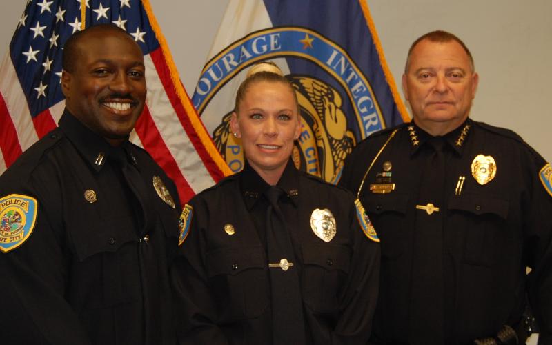 Lake City Police Chief Gerald Butler swore in new officers Amanda Pepin (center) and Donald Edouard (left) last week. (COURTESY)